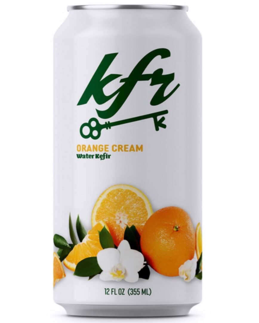 A white can of kfr orange cream kept with a white background.